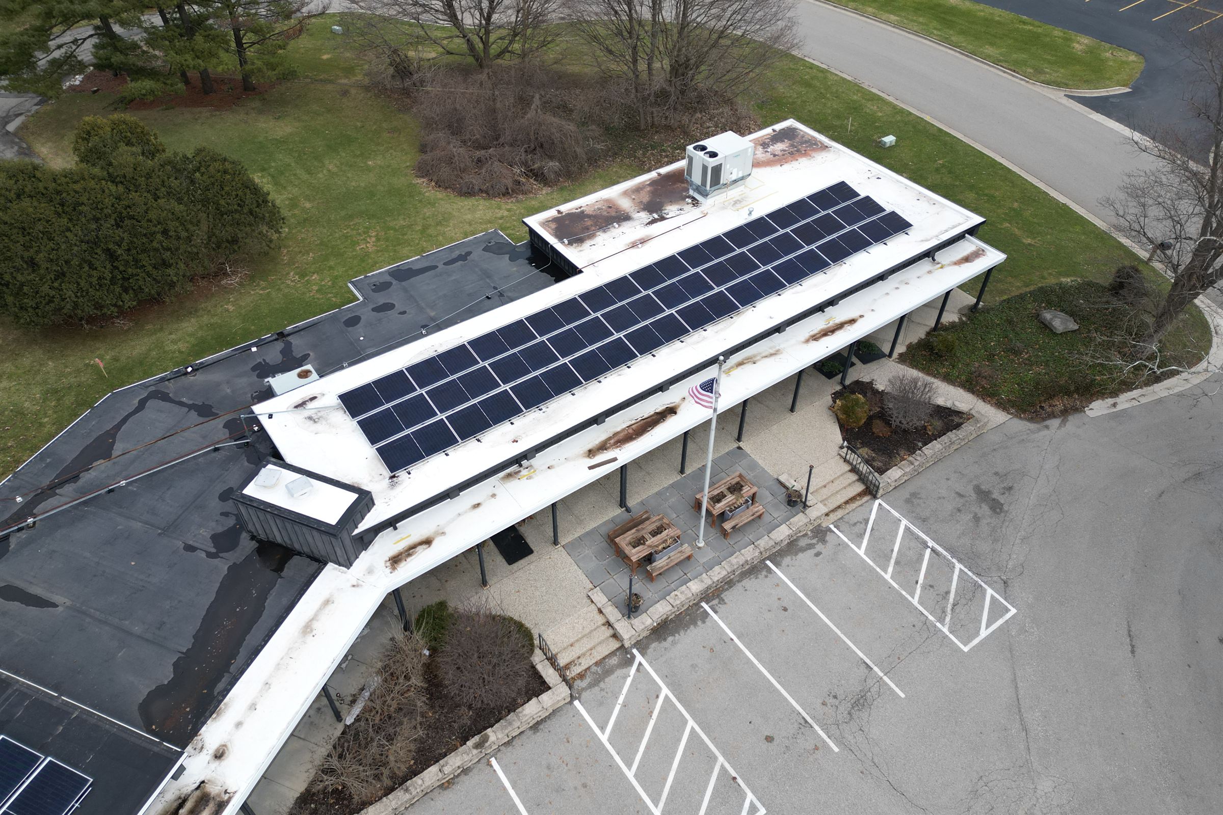 Completed commercial rooftop solar array on the Agave Ventures building in Cascade, Michigan