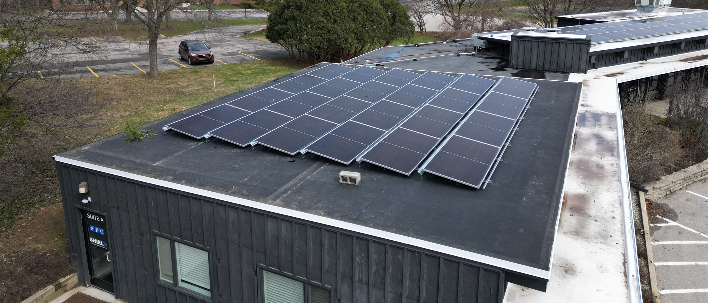 Solar array on the roof of a commercial building in West Michigan, installed by Augustine Solar